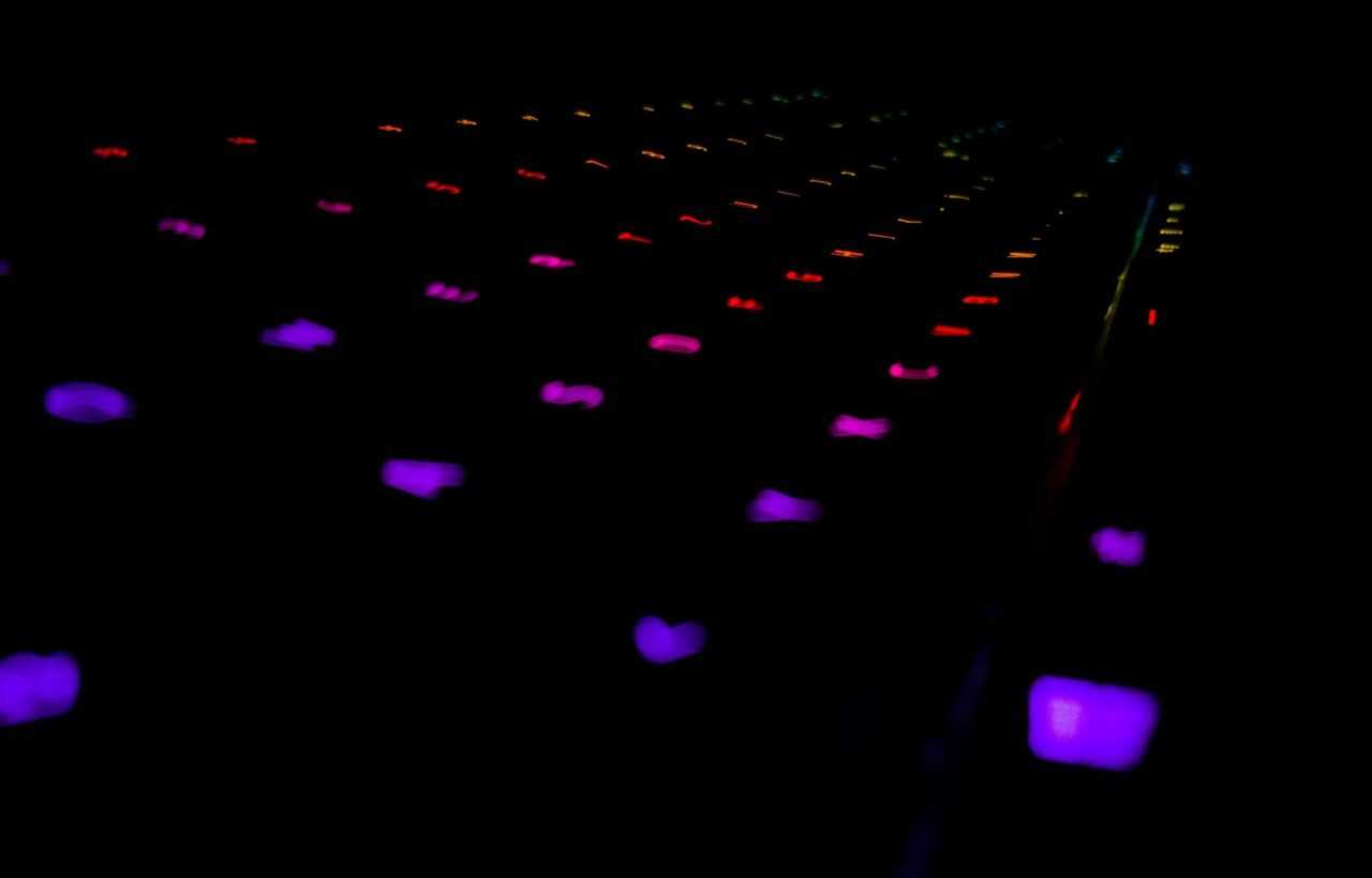 photo of colorful glowing keys on a keyboard
