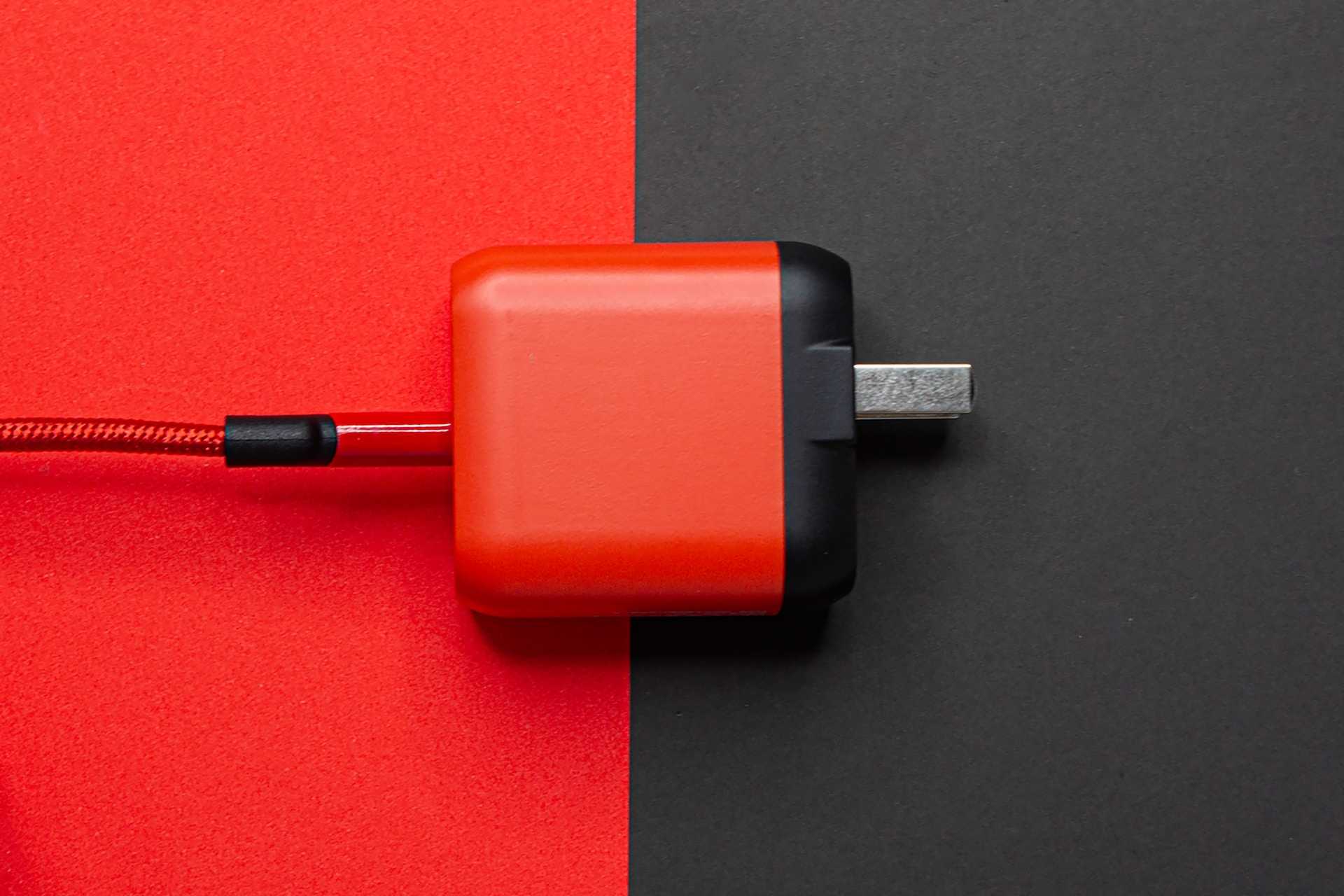 adapter on a red and black background